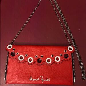Henri Bendel Red Clutch with Eyelet Detail